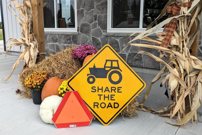 As part of Peterborough County's "Share the Road" campaign during October, new signage has been installed on County Road 2. Drivers are being asked to be patient when they encounter slow-moving farm vehicles and farm equipment on rural highways and roads, and pass them only when it is safe to do so. (Photo courtesy of Peterborough County)