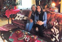 Wendy Smale with her daughter Carley on the set for the 2017 Lifetime holiday film "Snowed-Inn Christmas," for which Carley wrote the screenplay. Throughout her years as an educator, Wendy amassed large collections of children's books, which inspired Carley's love of reading and writing, and has also helped Carley with the editing of her screenplays. Now the duo have written "Tiny Astronaut," their first children's book. (Photo courtesy of Wendy and Carley Smale)