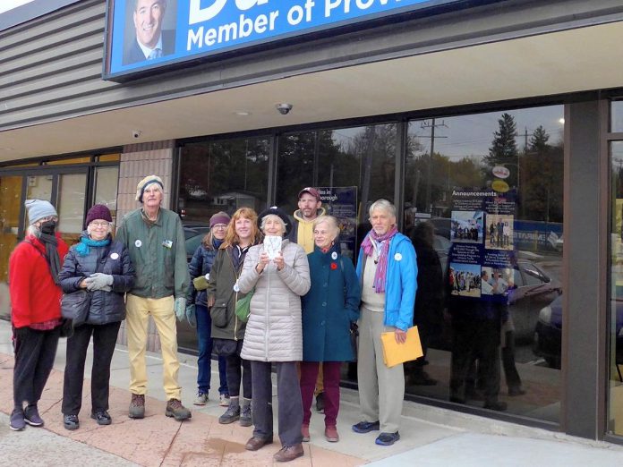 A delegation of 10 members from the environmental group For Our Grandchildren visited Peterborough-Kawartha MPP Dave Smith's constituency office on November 6, 2023 to deliver 100 postcards urging the Ford government to protect old-growth trees in the Catchacoma Forest from logging and to preserve the Greenbelt. (Photo courtesy of For Our Grandchildren)