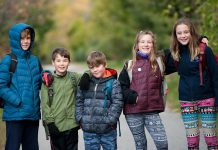 Five children on their way to school in Peterborough. Over the past few decades, the proportion of children who walk to school has decreased dramatically. (Photo: Active School Travel Peterborough)