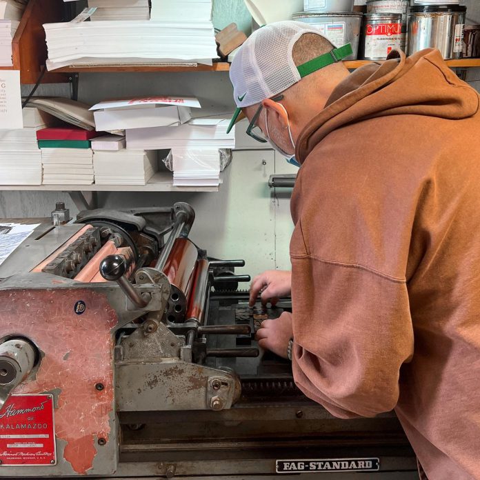 Artist Jeffrey Macklin in his studio for a printmaking demonstration during the 2022 Kawartha Art Studio Tour. The graphic designer has been a part of the tour for more than a decade, and encourages emerging artists to reach out to him if they want to learn more about printmaking. (Photo: Art Gallery of Peterborough)