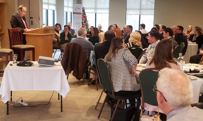 Peterborough Mayor Jeff Leal speaks to the crowd at the annual Mayor's Breakfast at the Peterborough Golf Country and Club on November 21, 2023. Hosted by the Peterborough and the Kawarthas Chamber of Commerce, the event also featured an update from Martin Imbleau, the newly minted CEO of VIA HFR (High Frequency Rail), on the planned high frequency rail corridor between Toronto and Quebec City. (Photo: Jeannine Taylor / kawarthaNOW)