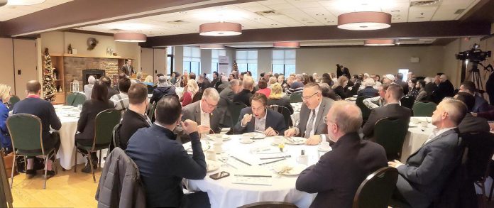 It was a full house for the annual Mayor's Breakfast at the Peterborough Golf Country and Club on November 21, 2023. Hosted by the Peterborough and the Kawarthas Chamber of Commerce, the event featured an update from VIA HFR CEO Martin Imbleau (pictured at podium) and from Peterborough Mayor Jeff Leal. (Photo: Jeannine Taylor / kawarthaNOW)