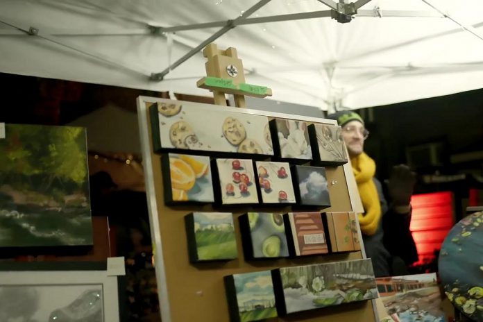  Organized by The Neighbourhood Vintage in partnership with First Friday Peterborough, the Neighbourhood Holiday Market in the Commerce Building Courtyard in downtown Peterborough on December 1, 2023 is a great opportunity to find unique holiday gifts produced by local creatives while supporting both the arts community and the local economy. (kawarthaNOW screenshot of First Friday Peterborough video)
