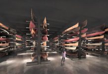 The Collection Hall at The Canadian Canoe Museum's new waterfront location in Peterborough will feature racks of canoes, kayaks, and paddled watercraft from around the world, representing diverse cultures and building techniques, each with a valuable story. The space will be visible to visitors and accessible for tours and by appointment. (Rendering: Lett Architects Inc.)