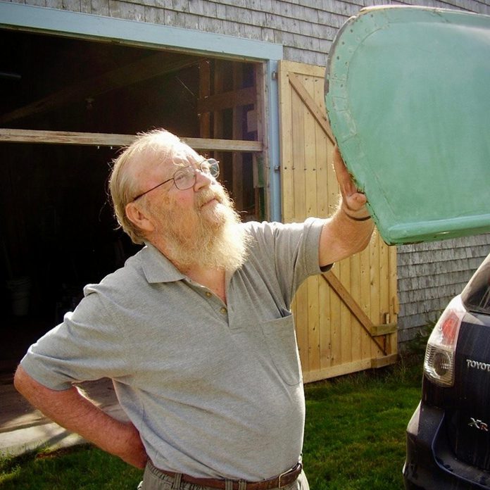 The late Canadian author and environmentalist Farley Mowat donated his beloved canoe, named Vagabond, to The Canadian Canoe Museum in 2006. Farley wished his "sweetheart" safe travels before the 1920s Peterborough Canoe Co. canoe began its journey to the museum. (Photo courtesy of The Canadian Canoe Museum)