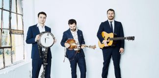 Juno-nominated and Canadian Folk Music Award winning Toronto-based bluegrass band The Slocan Ramblers (Frank Evans, Adrian Gross, and Darryl Poulsen with Charles James) are performing on Wednesday, December 6 at the Gordon Best Theatre in downtown Peterborough. (Photo via slocanramblers.com)