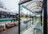 A Peterborough Transit bus in front of a transit stop. (Photo: City of Peterborough)