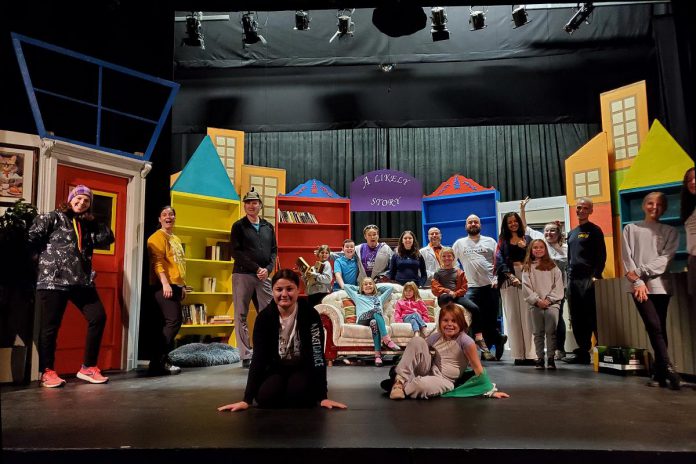 Cast and crew on the set for the Peterborough Theatre Guild's production of "The Enchanted Bookshop" by Todd Wallinger, which runs for eight performances from December 1 to 10, 2023. The family-friendly comic fantasy takes place in a used bookstore where literary characters come to life at night. (Photo courtesy of Peterborough Theatre Guild)