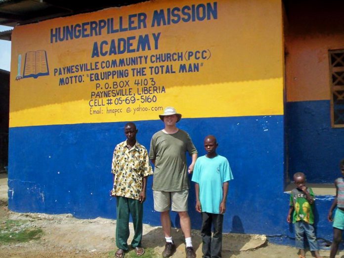 Theresa Foley and Peter Brown (pictured) founded the charity Humanwave which, since the 1990s, has been raising awareness and making a difference in the world, including in West Africa by raising funds for the drilling of safe water wells, the creation of a school food program, sponsoring students whose families can't afford to pay school fees, and helping to pay teachers in those schools. (Photo courtesy of Theresa Foley)