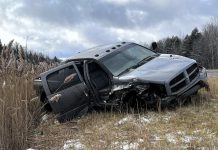 Peterborough County OPP released this photo of a pickup truck that collided with a commercial vehicle on Highway 115 at Highway 7A south of Peterborough. A 34-year-old woman who was an occupant of the pickup truck died after being thrown from the vehicle when a guardrail ripped off the passenger side door. (Police-supplied photo)