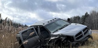 Peterborough County OPP released this photo of a pickup truck that collided with a commercial vehicle on Highway 115 at Highway 7A south of Peterborough. A 34-year-old woman who was an occupant of the pickup truck died after being thrown from the vehicle when a guardrail ripped off the passenger side door. (Police-supplied photo)