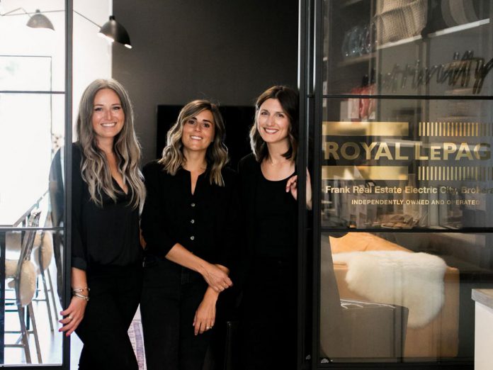 Linz Hunt, Lauren Ryan, and Megan Currie of Royal LePage Frank Real Estate Electric City Real Estate at 242 Hunter Street West in downtown Peterborough. Hunt opened the brokerage in 2020 with Ryan as client coordinator and Currie later joining the team as sales representative. As well as being co-workers and best friends, the three women also own the Burrow home store which Currie originally opened in 2013. (Photo: Ash Nayler)