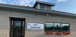 Peterborough Action for Tiny Homes (PATH) has launched a pilot program called "Ready for Home," which features a clothing hub and supply depot. At the former location of the Peterborough Humane Society at 385 Lansdowne Street, a small number of people experiencing homelessness work alongside community volunteers one day a week to clean, repair, and package clothing items and basic supplies to help unsheltered people during the brisk months ahead. (Photo: Margaret Slavin / PATH)