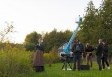 Peterborough actor Naomi Duvall waits as the production crew including Pawel Dwulit, Christian Moes, Drew Antzis, and Rob Viscardis prepares for a scene during the Paradigm Pictures filming of a proof-of-concept mini-series called "Grist" at Lang Pioneer Village in Keene in September 2023. Dwulit is involved in the Peterborough Kawartha Film Office, a not-for-profit organization currently curating a list of shooting locations as part of a three-phase plan to establish the region as a film production destination. (Photo: Zach Ward)