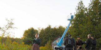 Peterborough actor Naomi Duvall waits as the production crew including Pawel Dwulit, Christian Moes, Drew Antzis, and Rob Viscardis prepares for a scene during the Paradigm Pictures filming of a proof-of-concept mini-series called "Grist" at Lang Pioneer Village in Keene in September 2023. Dwulit is involved in the Peterborough Kawartha Film Office, a not-for-profit organization currently curating a list of shooting locations as part of a three-phase plan to establish the region as a film production destination. (Photo: Zach Ward)