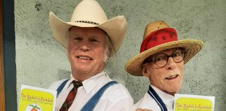Hank "Washboard Hank" Fisher and Willie "Catfish Willie" Lindsay with the children's book of poetry entitled "The Radish is Reddish and Other Vegetable Poems." (Photo courtesy of Washboard Hank and Catfish Willie)