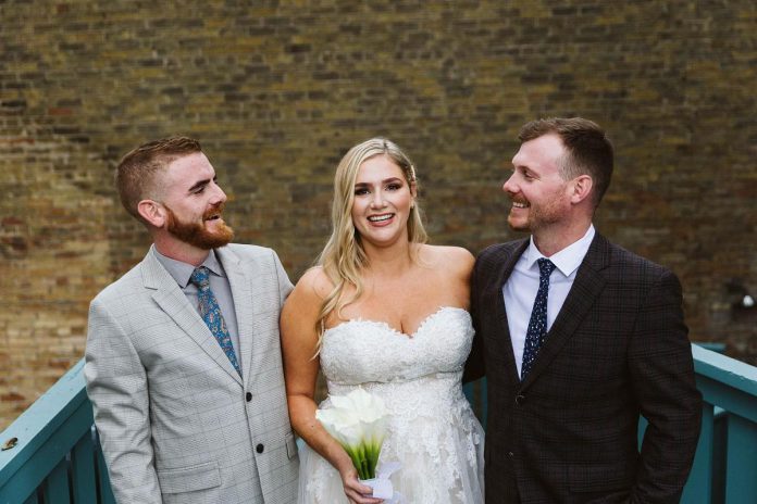 Eric Roter (left) with his sister Haley and brother Sam at Haley's wedding. (Photo courtesy of the Roter family)