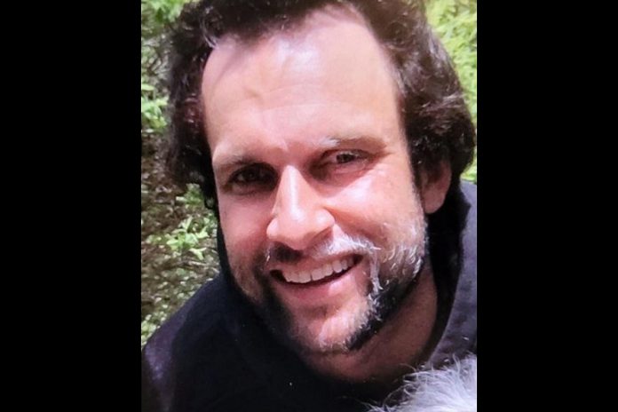 Peterborough County OPP are looking for this missing 34-year-old man, whose vehicle and dog were found abandoned just off County Road 507 in the Municipality of Trent Lakes on December 24, 2023. (Police-supplied photo)