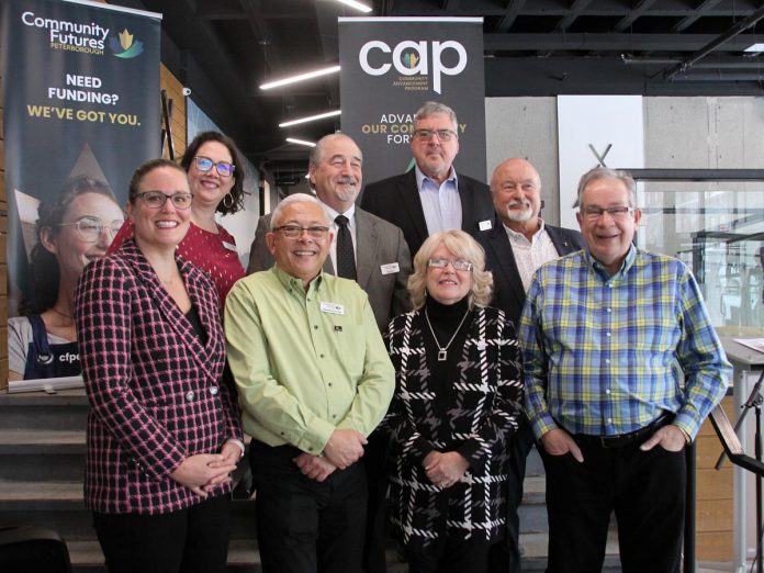 Applications for Community Futures Peterborough's new $50,000 Community Advancement Program funding will be evaluated by a committee comprised of Community Futures Peterborough staff and board members. Front row: Community Futures Peterborough executive director Devon Girard and board member Raymond Yip Choy, Peterborough County Warden Bonnie Clark, and Peterborough Mayor Jeff Leal Jeff Leal. Back row: Community Futures Peterborough board chair Charlina Westbye with board members Ron Black, Kevin Tomlinson, and Grant Seabrooke.  (Photo: Jeannine Taylor / kawarthaNOW)