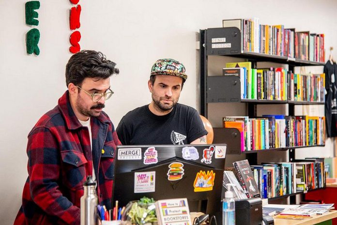 Andrew and Sean Fitzpatrick received a $5,000 micro grant after participating in the spring 2023 intake of Starter Company Plus and received a loan from Community Futres Peterborough, which helped them transform their online bookstore Take Cover Books into a bricks-and-mortar location in Peterborough's East City. (Photo: Rebecca Anne Bloom Photography)