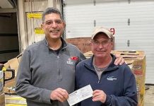 Canadian Tire Cobourg associate dealer Peter Puglia (left) stands with Northumberland County building superintendent Jim Davis in support of Northumberland County's Food 4 All Warehouse. (Photo: Northumberland County)