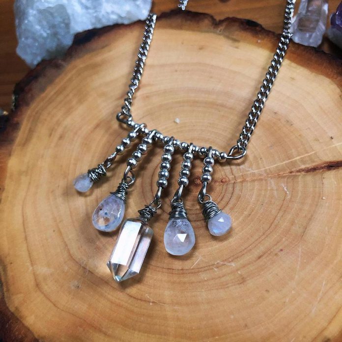 The Icy Jangly necklace, made with rainbow moonstone and a quartz point, by Moon Jangled Jewelry, one of the local artisans who will participate in the vendors market at  at INSPIRE's second annual International Women's Day event in Peterborough on March 8, 2024. (Photo: @moon.jangled / Instagram)