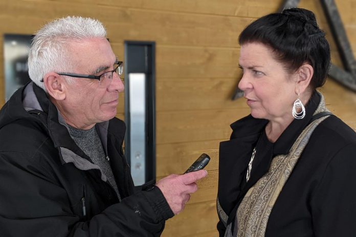 Writer Paul Rellinger speaks with kawarthaNOW founder, CEO, and publisher Jeannine Taylor, one of the 14 inductees of JA-NEO's 2024 Business Hall of Fame announced at VentureNorth in downtown Peterborough on January 17, 2024. (Photo: Bruce Head / kawarthaNOW)