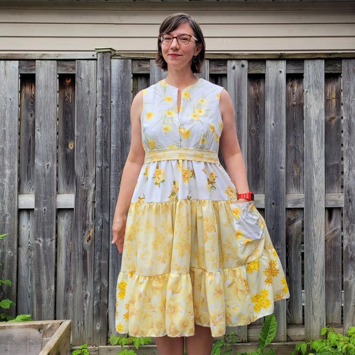 For her business Keetarella, Kathryn Bahun crafted a dress made from a discarded vintage bed sheet. More of her work, including gloves, sweaters, dresses, pouches and totes, can be found on Etsy, at GreenUp Peterborough and Watson & Lou, and at local markets and fairs. (Photo courtesy of Kathryn Bahun)