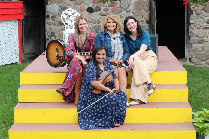 4th Line Theatre's managing artistic director Kim Blackwell (middle) joins musician Saskia Tomkins (bottom), singer-songwriter Kate Suhr (left), and storyteller Megan Murphy during a media day at 4th Line Theatre on Millbrook in August 2021, promoting The Verandah Society, a show created by Murphy and Suhr during the pandemic. (Photo: Hannah Abrahamse / kawarthaNOW)