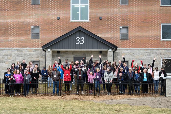 In April 2022, Habitat for Humanity Peterborough & Kawartha Region helped 41 individuals, seniors, couples, and families become homeowners with the completion of phase one of the 33 Leahy's Lane multi-residential condominium. This project was the first of its kind for Habitat for Humanity across Canada, which has traditionally built single-family homes. (Photo courtesy of Habitat for Humanity Peterborough & Kawartha Region)