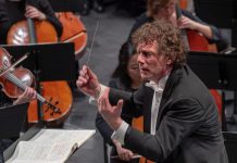 Peterborough Symphony Orchestra music director and conductor Michael Newnham in 2019. During "Popcorn, Please!" at Showplace Performance Centre on February 3, 2024, Maestro Newnham will lead the orchestra as they perform music from popular films including Star Wars, E.T., Mission: Impossible, the James Bond and Lord of the Rings franchises, and more. (Photo: Huw Morgan)