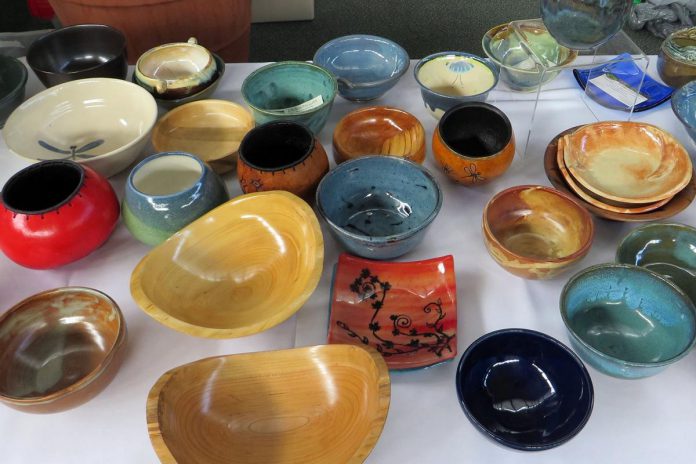 Some of the unique hand-crafted ceramic and wooden bowls donated by local artisans of the Kawartha Potters Guild and Kawartha Woodturners Guild for a past Empty Bowls fundraiser. YWCA Peterborough Haliburton's annual fundraiser to alleviate food insecurity returns for its 20th year on February 23, 2024 at The Venue in downtown Peterborough with an in-person seated lunch for the first time since the pandemic began. (Photo: Kawartha Potters Guild / Facebook)