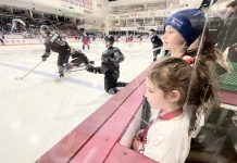 Clients of Five Counties Children's Centre who took take part in the Next Gen Game with the Peterborough Petes got a rink-side seat for the pre-game warmup as the Petes readied to play the Kitchener Rangers on February 19, 2024. In total, more than $21,300 was raised at the game to support treatment service at Five Counties. (Photo courtesy of Five Counties Children's Centre)