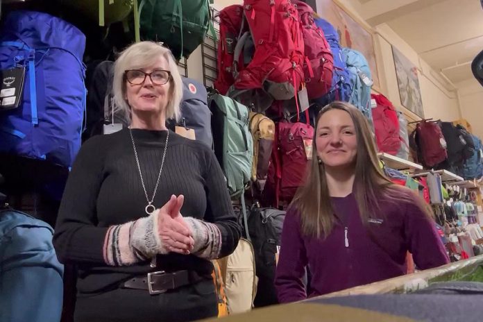 Nancy Wiskel (left), owner of Dan Joyce Clothing in downtown Peterborough, is partnering with other local businesses to host drop-in educational events at her store every month. Wild Rock Outfitters co-owner and general manager Tori Silvera (right) will discuss the benefits of sunshine and the great outdoors on mental well-being at the first drop-in event on February 22, 2024 called "Beat the Blues," which will also feature nutritionist Jodi-Lee Forestell and Flow Spa Float Centre and Sports Recovery founder RJ Kayser. (Photo courtesy of Dan Joyce Clothing)