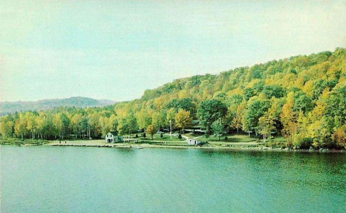 Author Deloris Packard's career in the hospital industry began with her first job at the former Elephant Lake Lodge in Harcourt, pictured in a postcard from 1960. Located close to the hobby farm where she grew as the youngest of eight children, Packard was drawn to the family-run feel of the business. (Photo: Camp Eden Woods / Facebook)