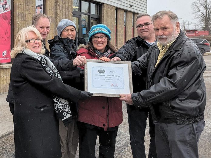 The Peterborough Agricultural Roundtable presented its second annual Peterborough Agricultural Innovation Award on February 15, 2024 to Ava Richardson and Kiyotami (Zenryu) Owatari of Hello Farm in Havelock. Pictured at Sunderland Co-op are, left to right, Peterborough County warden and roundtable member Bonnie Clark, Havelock Belmont Methuen Township mayor Jim Martin, award winners Owatari and Richardson, Garth Stoner of co-sponsor Sunderland Co-op, and roundtable member Elmer Buchanan. (Photo: Peterborough County)