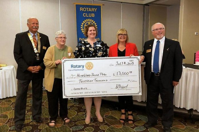 Operated by the Peterborough Housing Corporation with no ongoing government funding, Homeward Bound Peterborough is supported through donor contributions. Rotary Club of Peterborough immediate past president Ken Tremblay (left) and Rotarians and auction co-chairs Amy Simpson and Bruce Gravel auction co-chairs (right) present a cheque for $13,000 to Maisie Watson and Lisa Smith from Homeward Bound Peterborough at the club's July 8, 2019 meeting at the Holiday Inn Peterborough Waterfront. (Photo courtesy of Rotary Club of Peterborough)