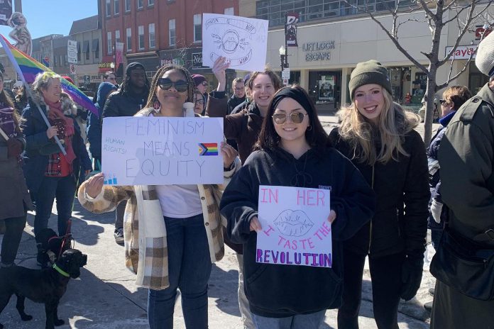 Some of the attendees at the 2023 International Women's Day event in Peterborough organized by Kawartha World Issues Centre and Kawartha Sexual Assault Centre in collaboration with community partners. Taking place on March 8, 2024, this year's event also includes an afternoon march and rally in downtown Peterborough followed by a community event in the evening. (Photo courtesy of Kawartha World Issues Centre)