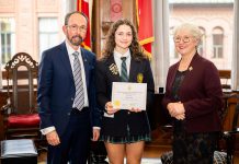 Maude Rose Craig with her Lieutenant Governor's Ontario Heritage Award for Youth Achievement, flanked by Ontario Heritage Trust board chair John Ecker and Ontario's lieutenant governor Edith Dumont, at the awards ceremony in Toronto on February 22, 2024. (Photo: Dahlia Katz)