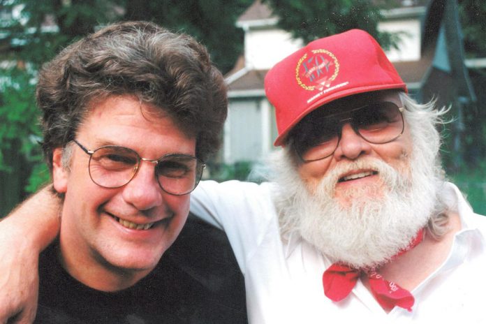 On Saturday afternoon, the Peterborough Musicians Benevolent Association is hosting "Remembering Buzz" at Dr. J's BBQ & Brews in downtown Peterborough, a musical tribute to the late Brian "Buzz" Thompson (pictured with the late Ronnie Hawkins). Affectionately known as "Mr. Soul", Buzz was a beloved musician who was a founding member of The Hangmen in the 1960s and a long-time guitarist and vocalist for Ronnie Hawkins and The Hawks. Local musicians who will perform their favourite songs by Buzz include Beau Dixon, Jane Archer, Bridget Foley, J.P. Hovercraft, Gary Peeples, Andy Pryde, Sam and Ryan Weber, Mark Beatty, Dennis O'Toole, Jim Leslie, Brent Bailey, Jim Usher, and Al Black. (Photo via Mark Beatty / Facebook)