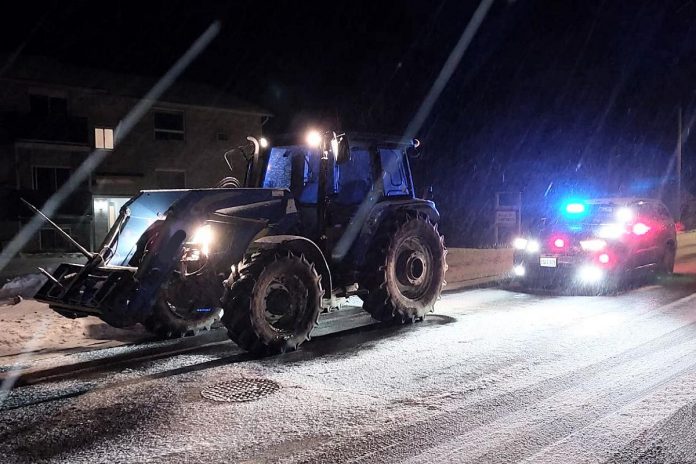 The 19-year-old driver of this tractor had his licence suspended for 90 days and is facing impaired driving charges after being pulled over by police on County Road 30 in Brighton on February 17, 2024. (Photo: Ontario Provincial Police)