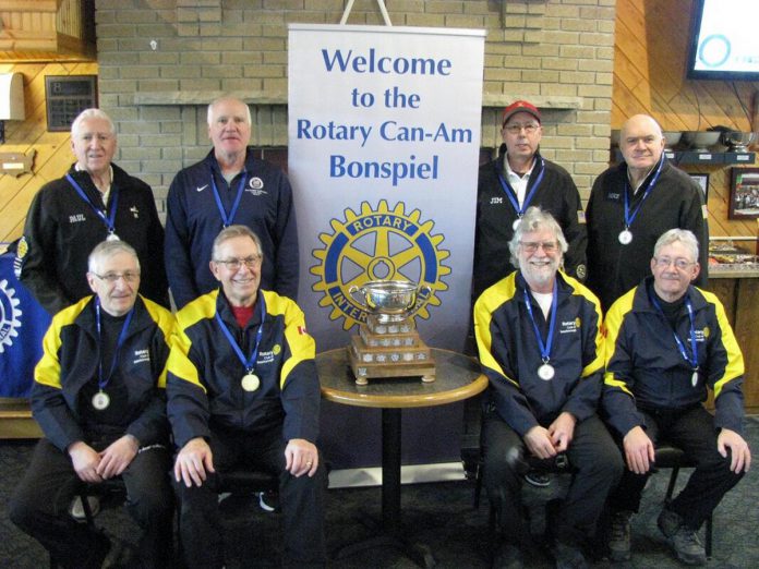 The Rotary Club of Peterborough's curling team (front row, left to right: Ken Seim, Nick Avlonitis, Joe Kapron, and Bill Crins) with their trophy from the Rotary Can-Am Curling Championships held in Rice Lake, Wisconsin from February 1 to 3, 2023. Also pictured in the back row is the runner-up team representing Madison, Wisconsin (Paul Matzke, Rich Lepping, Jim Sirianni, Mike Pfiffner). The Peterborough team has secured a berth in the 28th Rotary World Curling Championships taking place in Scotland in 2026. (Photo: International Curling Fellowship of Rotarians)