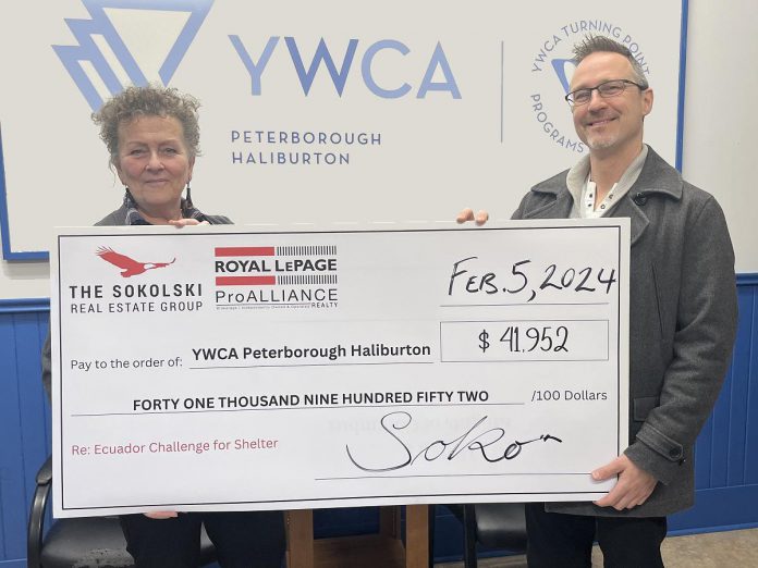 Peterborough real estate agent Mark Sokolski of The Sokolski Real Estate Group presented a donation of $41,952 to YWCA Peterborough Haliburton's executive director Kim Dolan on February 5, 2024. Sokolski fundraised $52,440 for Royal LePage Shelter Foundation's Ecuador Challenge for Shelter in November, with 80 per cent of the funds supporting the YWCA. (Photo courtesy of YWCA Peterborough Haliburton)