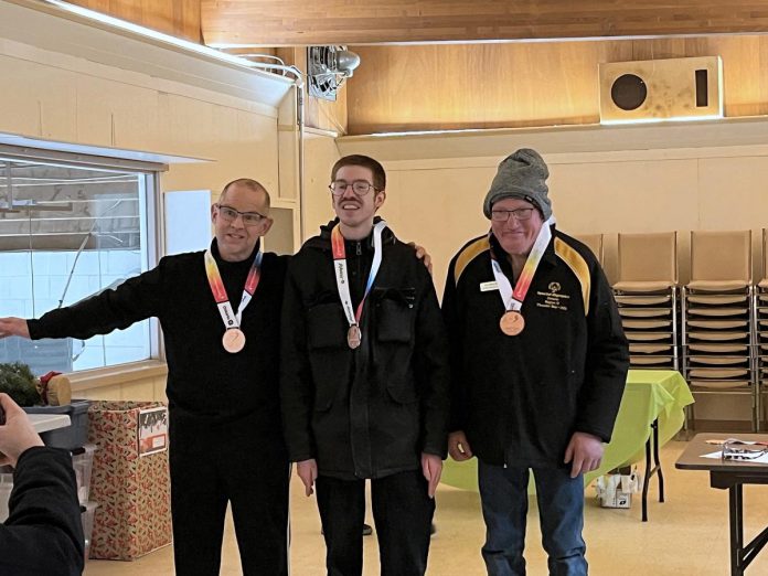 In December, the Lindsay Hard Rockers curling club took two teams to the Funspiel hosted by SOO-Muskoka at the Gravenhurst curling club. Both teams returned home with medals. Pictured from left to right are Bradley Wayles, Alan Craig, and Keith Bacon. (Photo courtesy of Special Olympics Ontario)