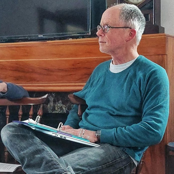 Gerry McBride directs a script reading of "Tide of Hope," Trent Valley Archives Theatre's inaugural production. Auditions for volunteer actors will be held on February 29, 2024 at Trent University's Sadleir House. (Photo: Suzanne Schroeter)