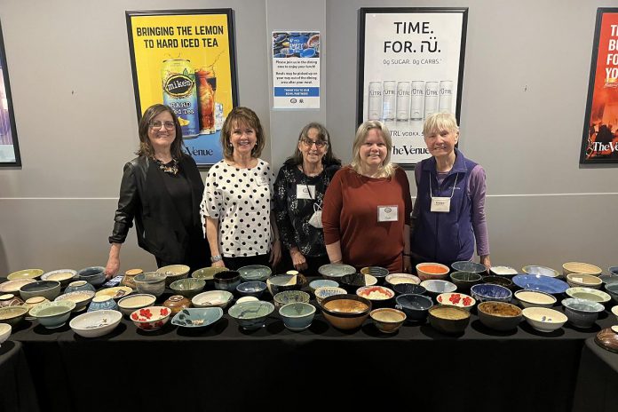 Members of the Kawartha Potters Guild who, along with members of the Kawartha Woodturners Guild, hand crafted and donated all the bowls for the 2024 YWCA Empty Bowls event on February 23 at The Venue in downtown Peterborough. (Photo courtesy of YWCA Peterborough Haliburton)