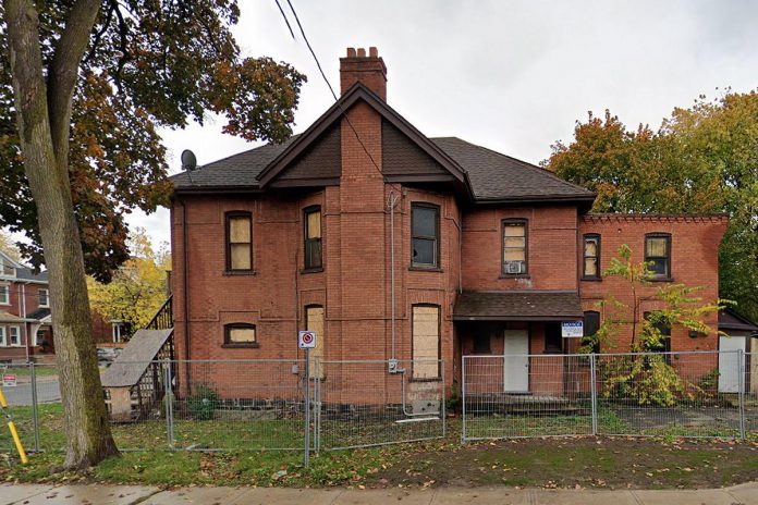Peterborough police are investigating a suspicious fire at a vacant former rooming house at the corner of Water and London streets, pictured in October 2020. The building was boarded up after being gutted by a fire in 2019 and, prior to that, had been the scene of multiple police investigations over several years. (Photo: Google Maps)