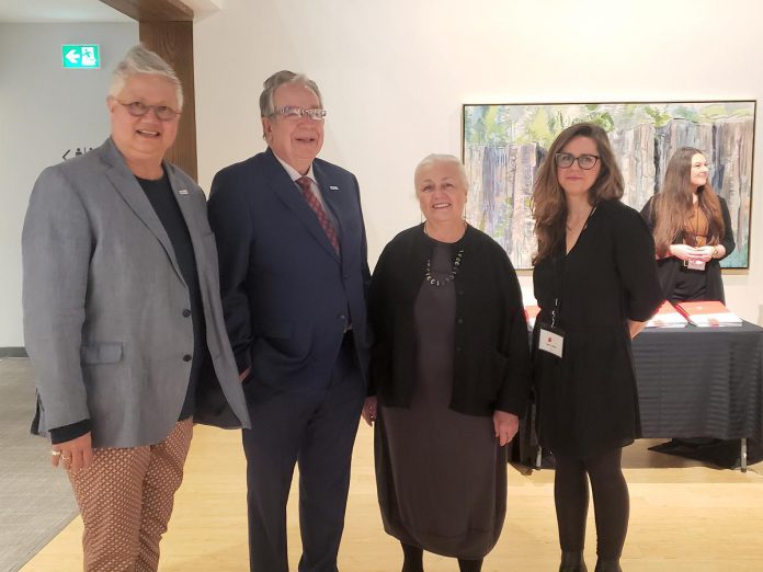 Peterborough city councillor Joy Lachica and Peterborough mayor Jeff Leal with Art Gallery of Peterborough director Celeste Scopelites and curator Fynn Leitch during an event on March 15, 2024 at the gallery when the non-profit organizations announced upcoming events to celebrate its 50th anniversary. (Photo: Jeannine Taylor / kawarthaNOW)