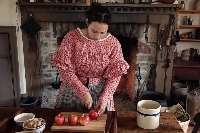 For her thesis project, Carelton University public history master's candidate Holly Benison has launched a video series that combines the cooking network with the history channel. In "The Backwoods Kitchen," she follows recipes from Upper Canada settler Catharine Parr Traill's 1854 book "The Female Emigrant's Guide" such as preserved apples. Throughout the series, she shows historical cooking practices and shares other 19th-century history, all while using the Fitzpatrick House at Lang Pioneer Village Museum in Keene. (kawarthaNOW video screenshot)